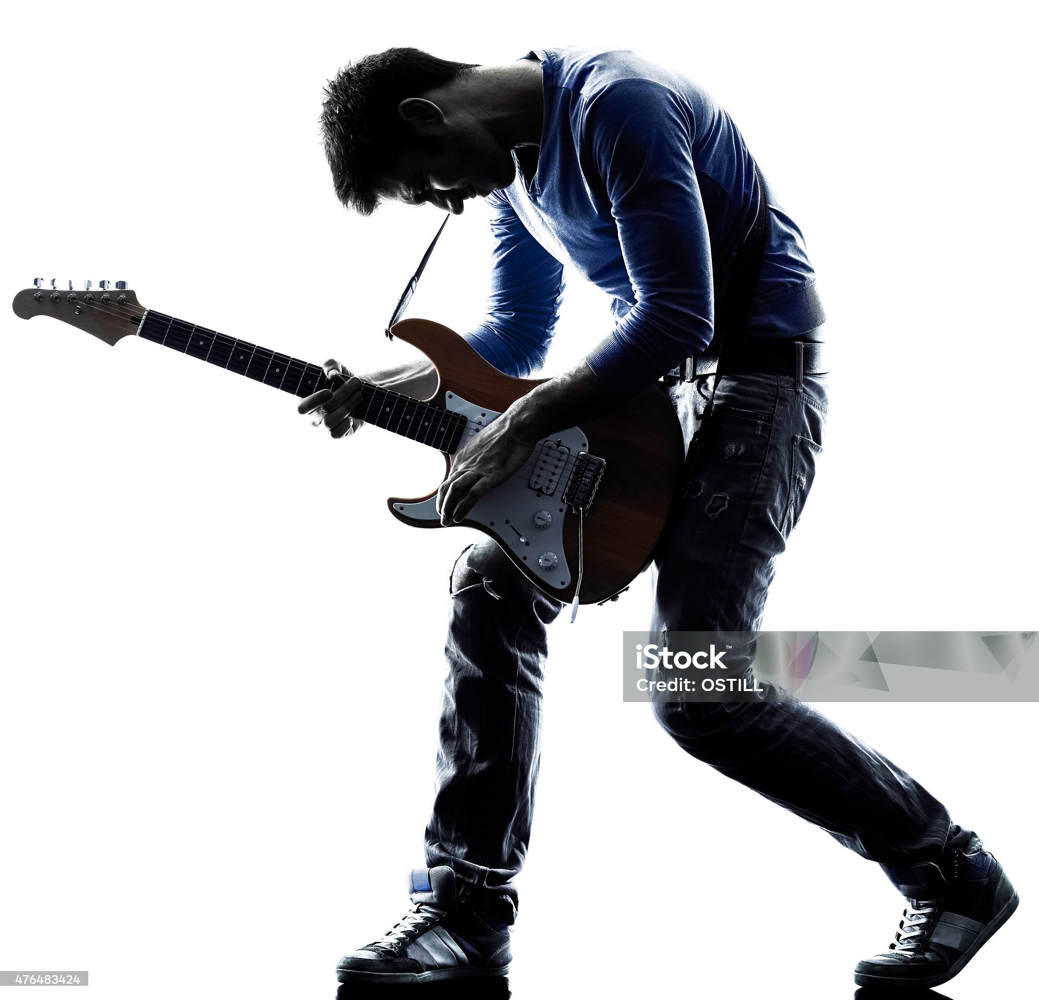 man playing electric guitar